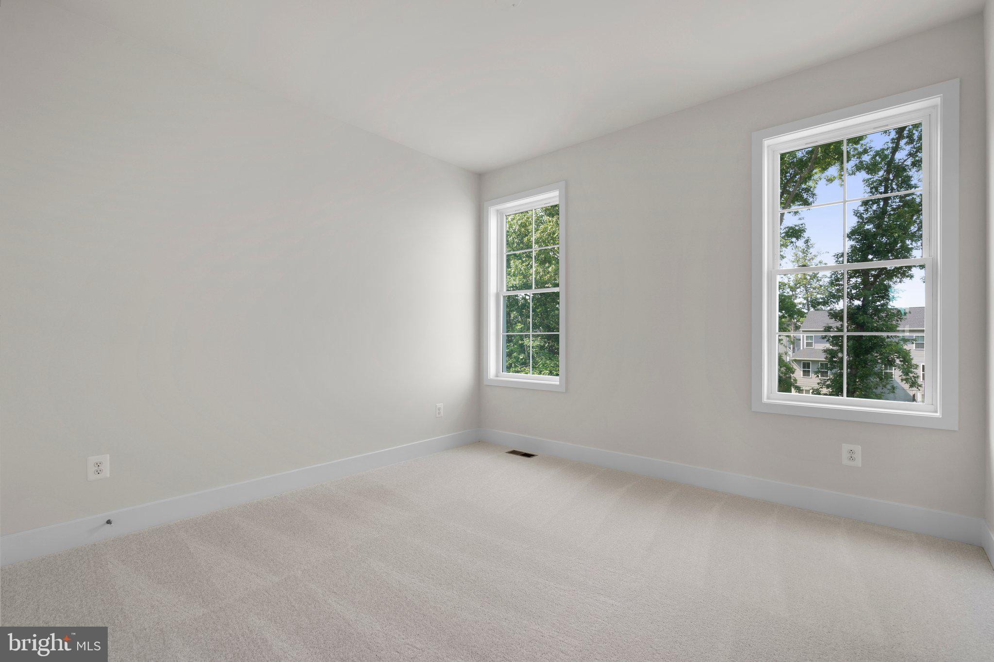 100 Alabaster Lane Stephenson, VA 22656 - Photo 23 of 44 an empty room with windows