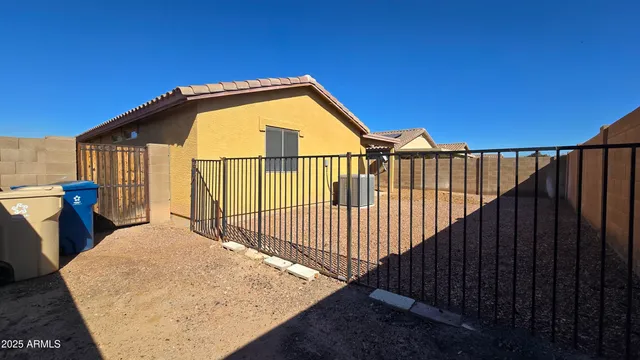 a view of balcony with a small yard