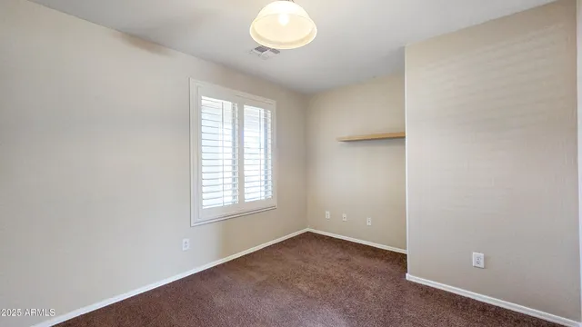 an empty room with window