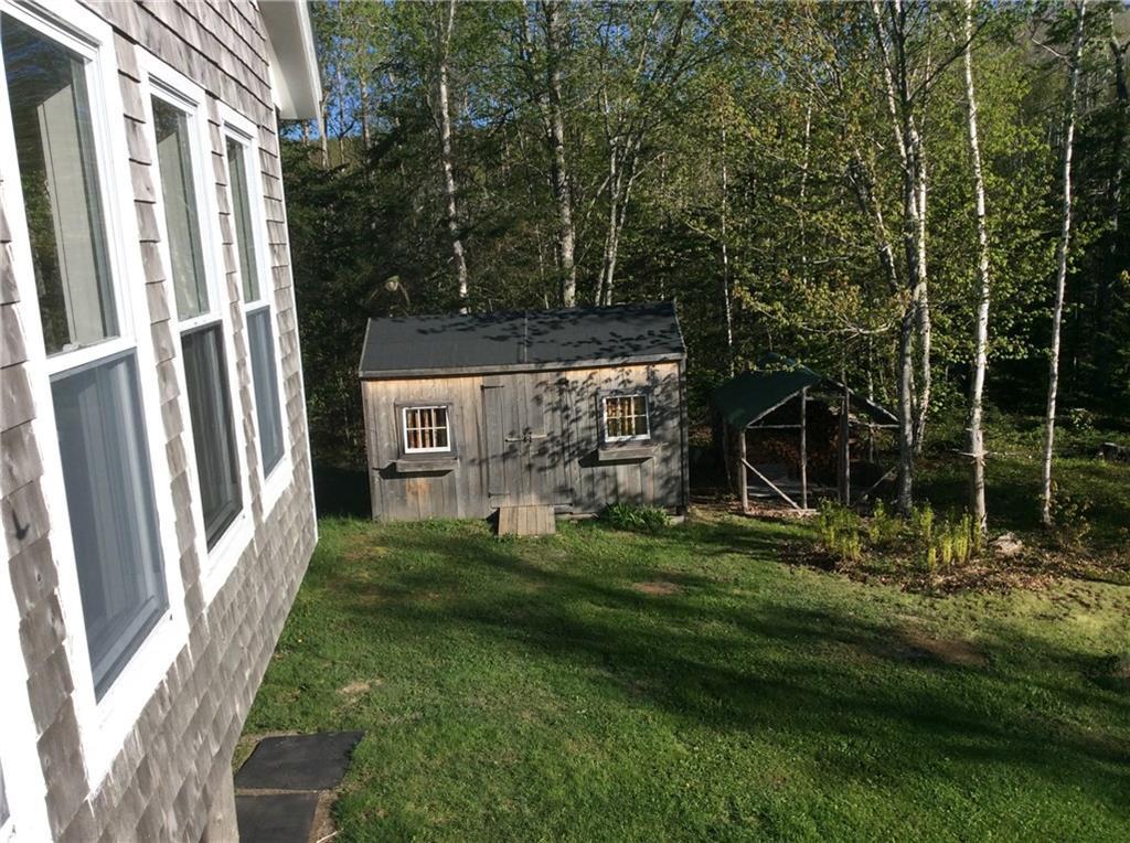 380 Lead Mine Road Lubec, ME 04652 - Photo 5 of 25 Firewood storage on the edge of the...