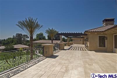 Undisclosed Address Bradbury, CA 91008 - Photo 15 of 19 a view of a patio with table and chairs and potted plants