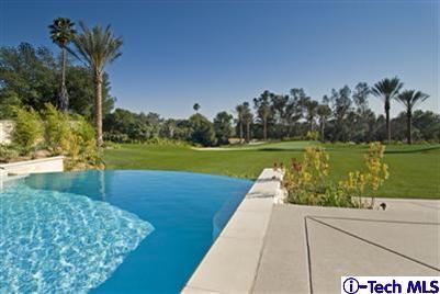 Undisclosed Address Bradbury, CA 91008 - Photo 7 of 19 a view of a golf course with a lake