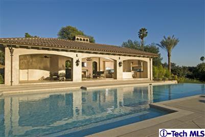 Undisclosed Address Bradbury, CA 91008 - Photo 8 of 19 a front view of a house with a yard