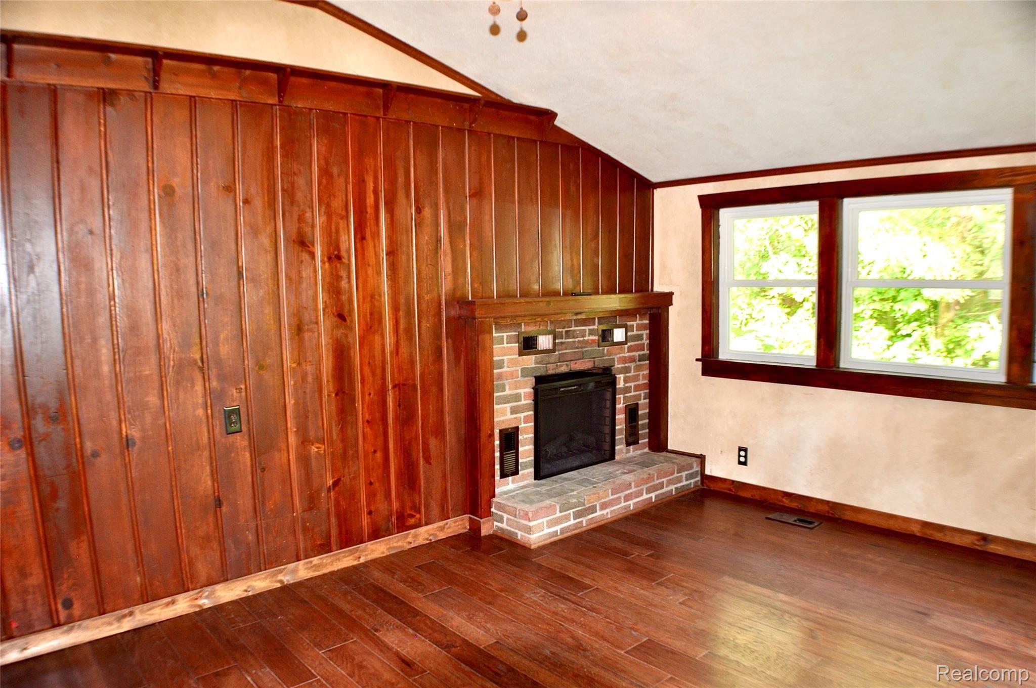 1245 East Buno Road Milford, MI 48381 - Photo 13 of 30 Family Room with electric fireplace.