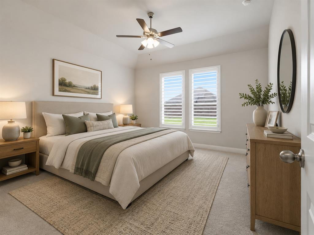 1601 Radecke Road Krum, TX 76249 - Photo 10 of 32 a bedroom with a bed and a chandelier