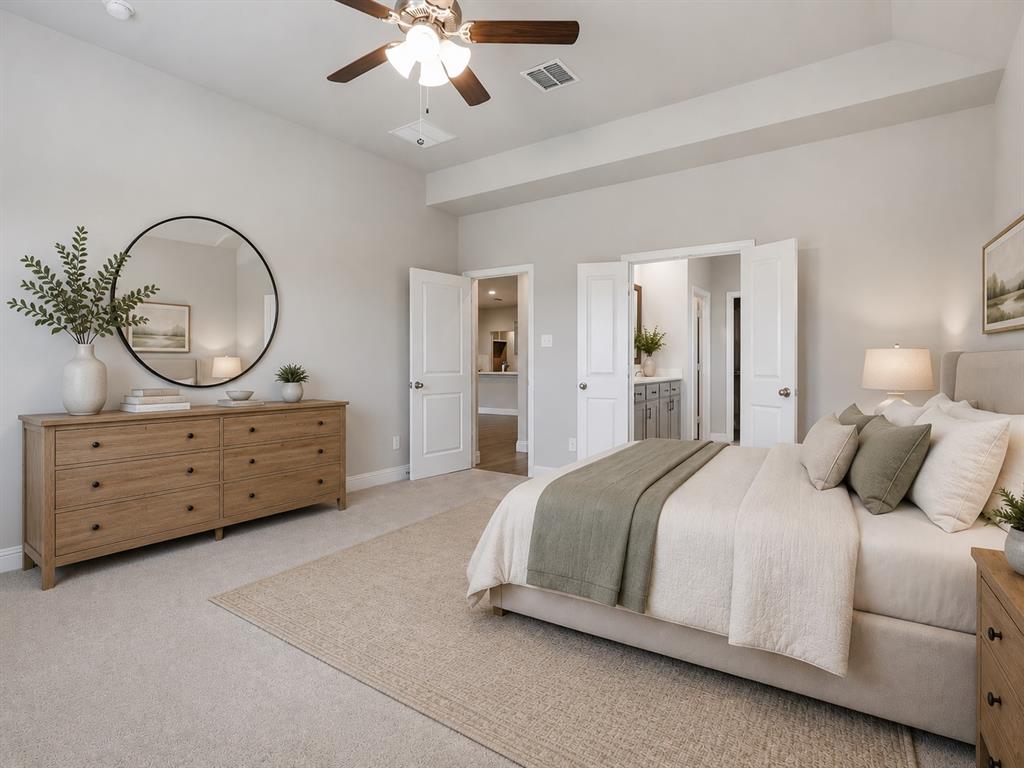 1601 Radecke Road Krum, TX 76249 - Photo 12 of 32 a bedroom with a bed and a chandelier