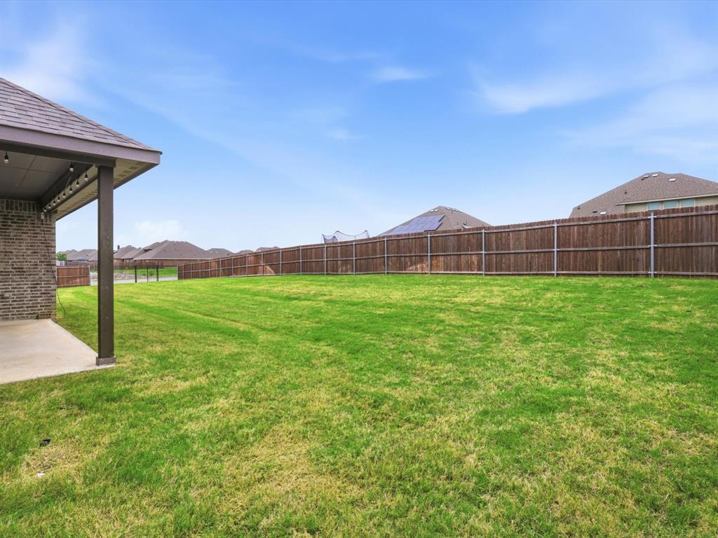 1601 Radecke Road Krum, TX 76249 - Photo 28 of 32 a view of a backyard