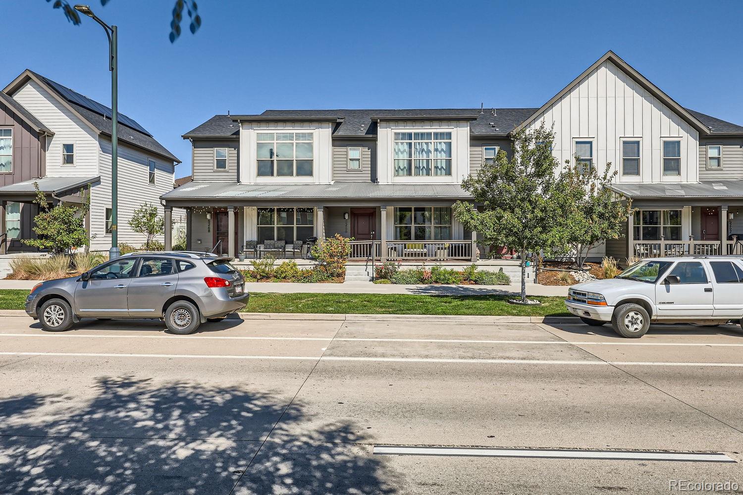 5266 Central Park Boulevard Denver, CO 80238 - Photo 2 of 23 a car parked in front of a house
