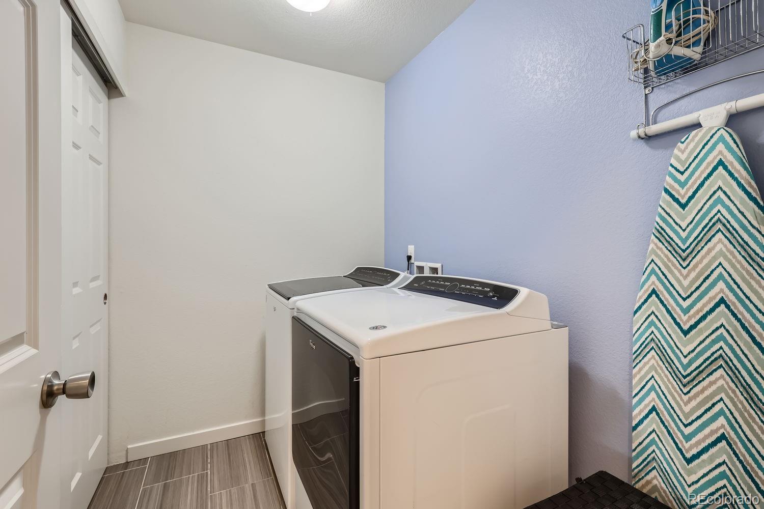 5266 Central Park Boulevard Denver, CO 80238 - Photo 21 of 23 a utility room with dryer and washer