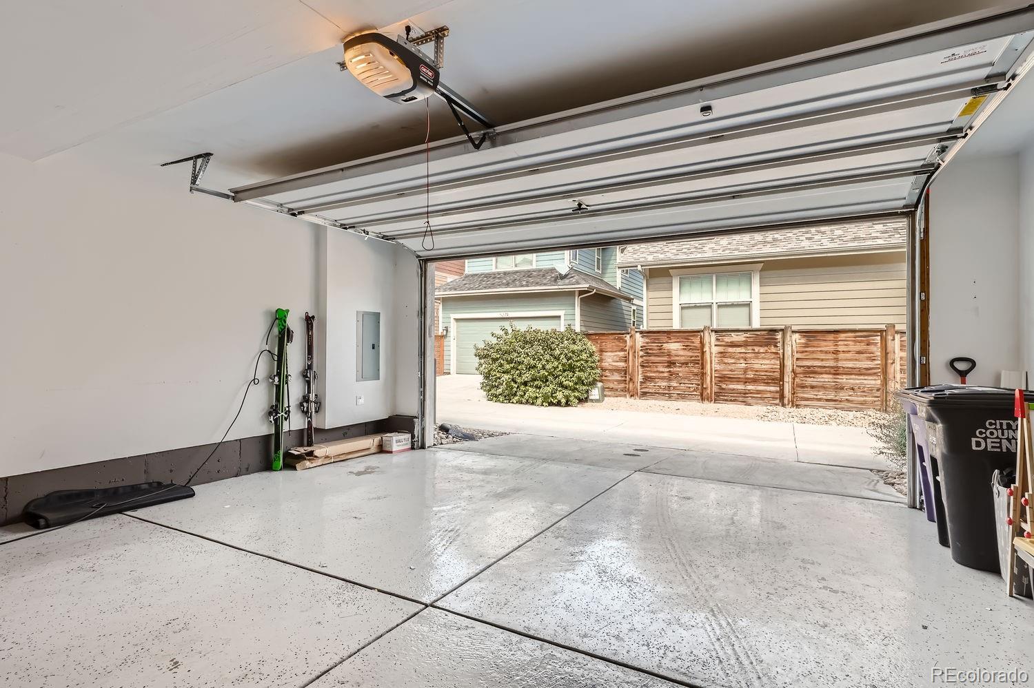 5266 Central Park Boulevard Denver, CO 80238 - Photo 22 of 23 a view of empty room with wooden floor and fan