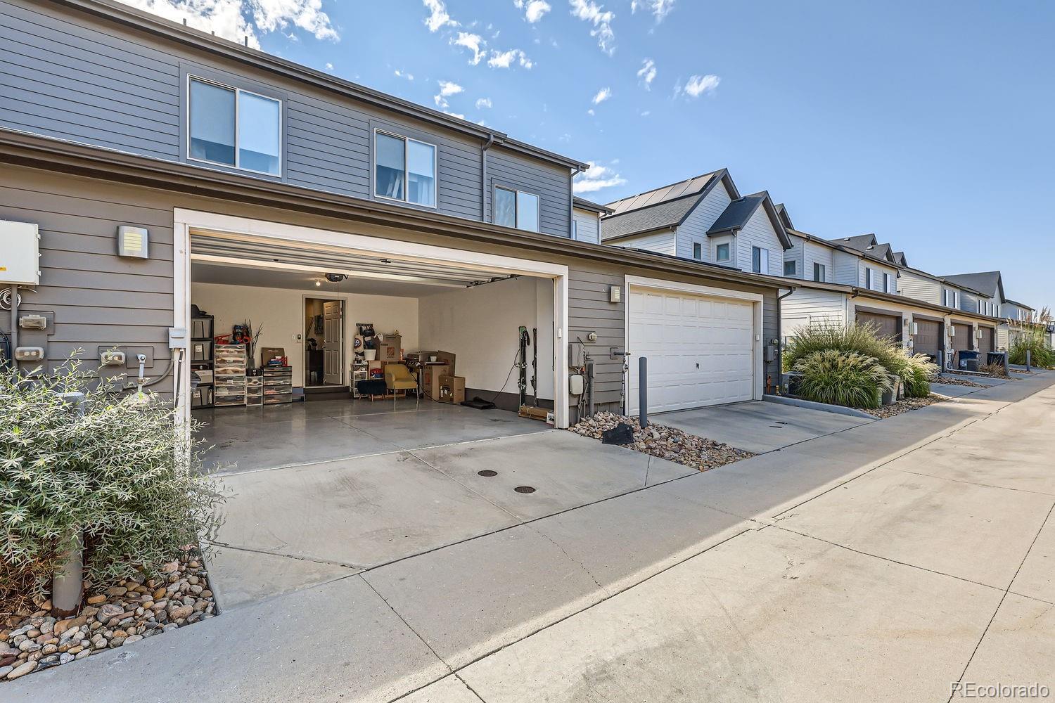 5266 Central Park Boulevard Denver, CO 80238 - Photo 23 of 23 a view of a house with a patio