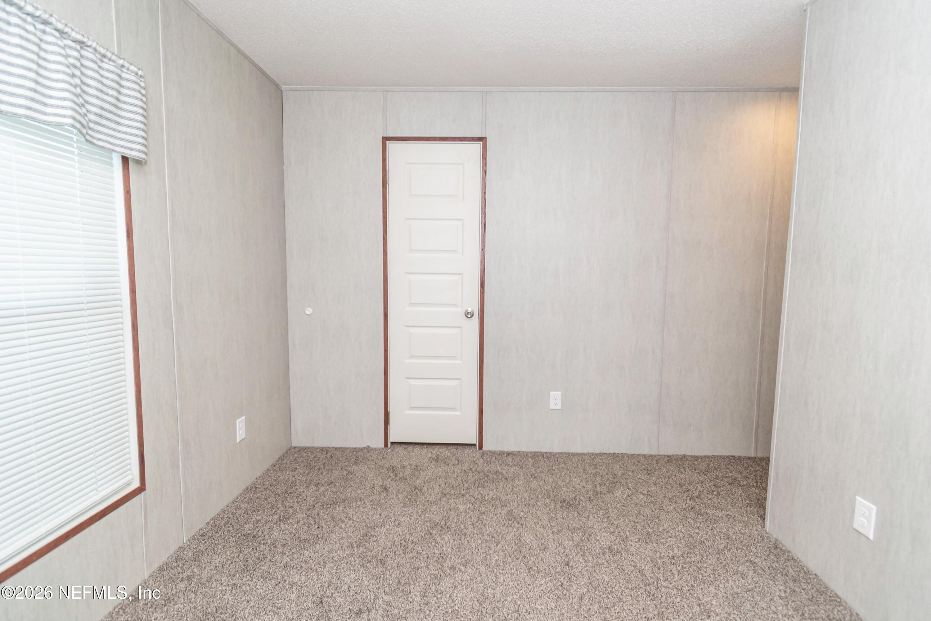 6171 Bill Davis Road Glen St. Mary, FL 32040 - Photo 13 of 28 an empty room with windows