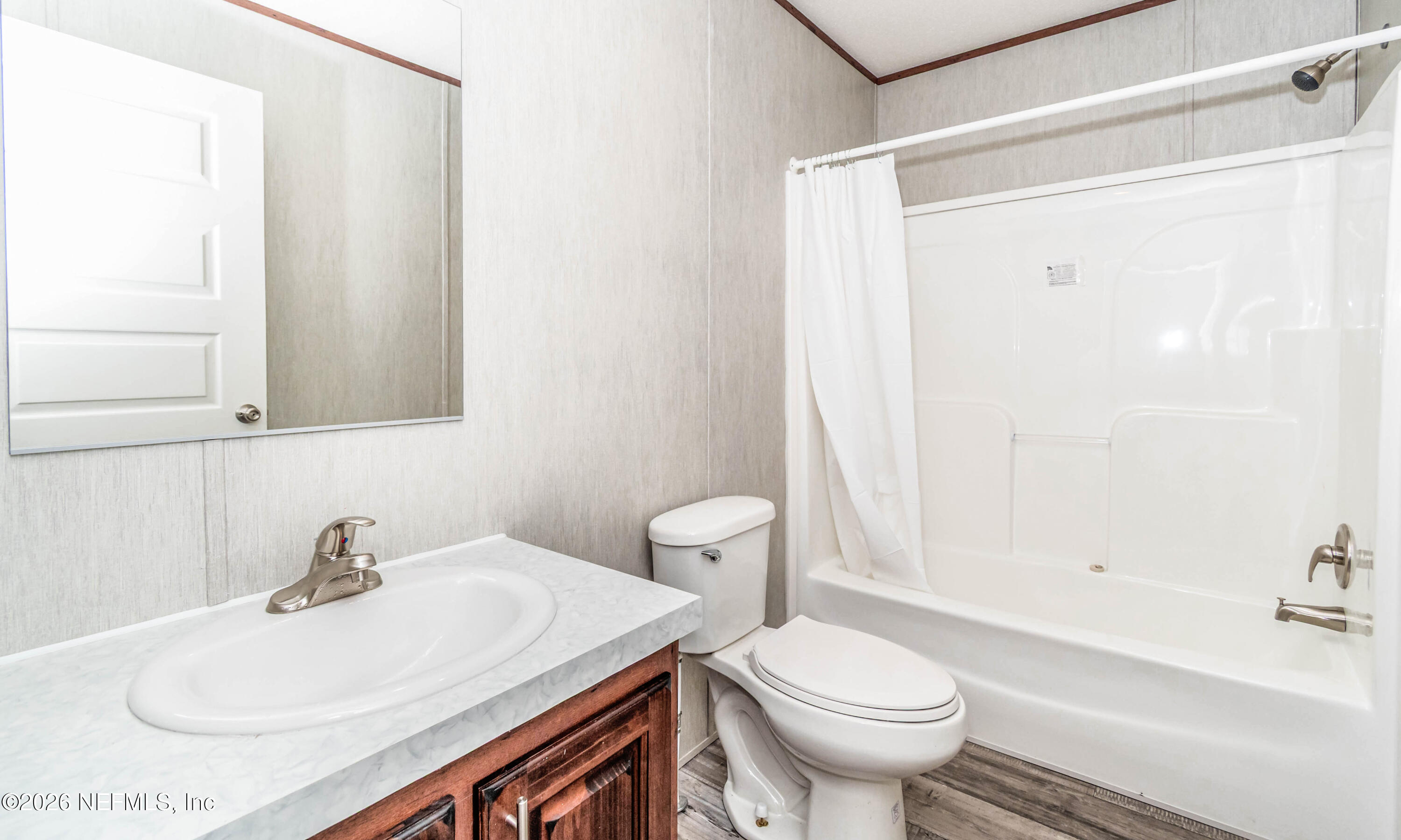 6171 Bill Davis Road Glen St. Mary, FL 32040 - Photo 16 of 28 a bathroom with a sink toilet and shower