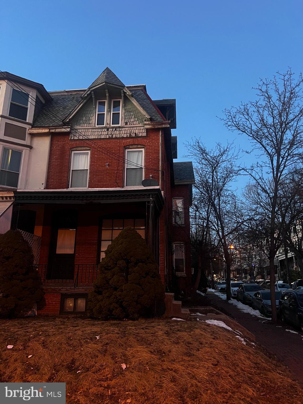 a front view of a house with yard