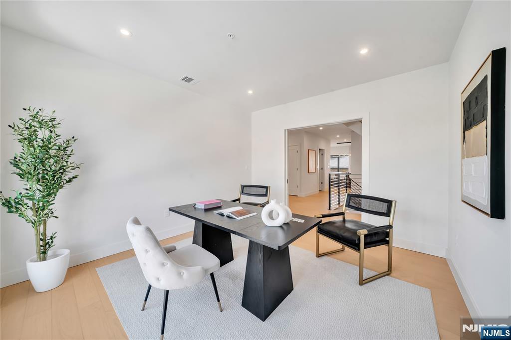 2220 MacKay Avenue, Unit A Fort Lee, NJ 07024 - Photo 14 of 45 a view of a dining room with furniture and window