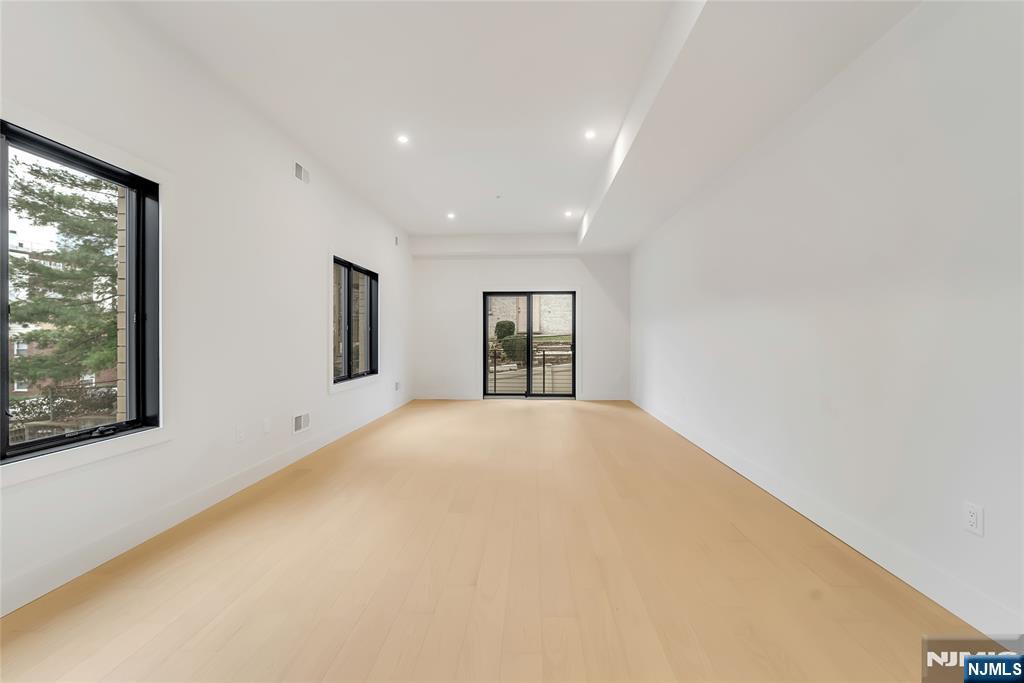 2220 MacKay Avenue, Unit A Fort Lee, NJ 07024 - Photo 38 of 45 a view of an empty room with a window