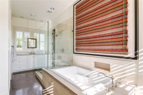 a bathroom with a sink and a bathtub