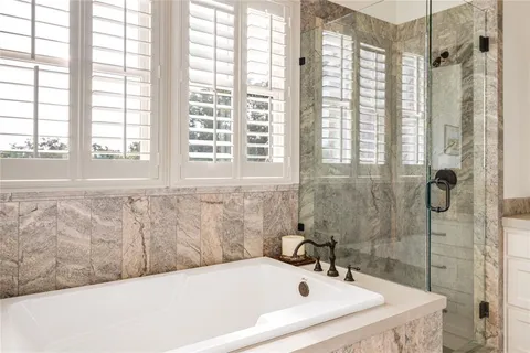 a bathroom with a sink and a bathtub