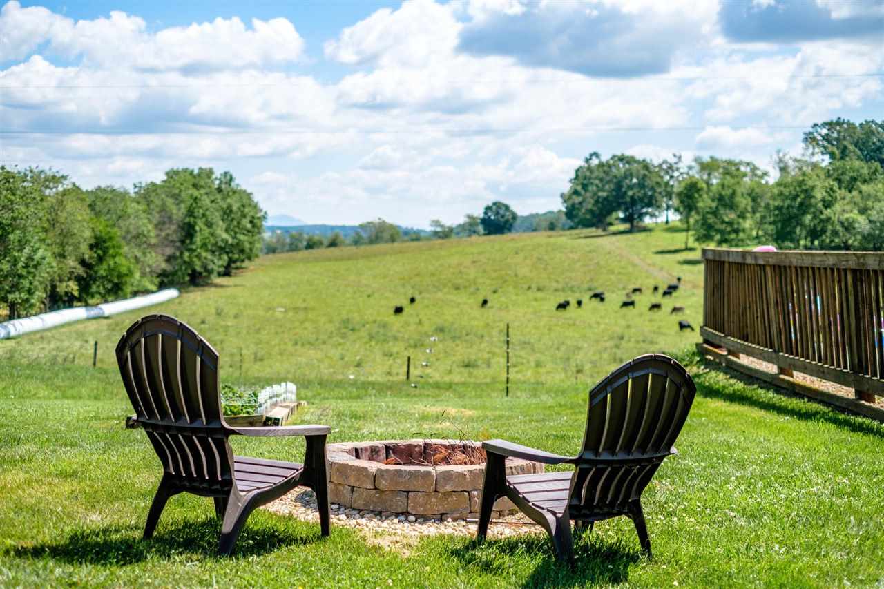 3557 Shutterlee Mill Road Staunton, VA 24401 - Photo 30 of 42 a view of a chairs and table in the patio