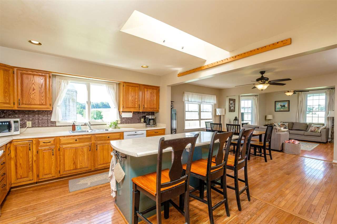 3557 Shutterlee Mill Road Staunton, VA 24401 - Photo 3 of 42 a large kitchen with lots of dining table and chairs
