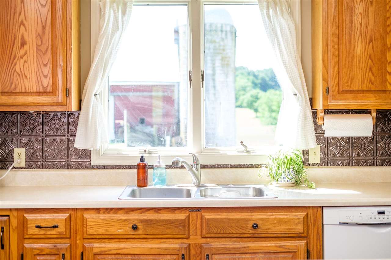 3557 Shutterlee Mill Road Staunton, VA 24401 - Photo 4 of 42 a bathroom with a granite countertop sink and a window