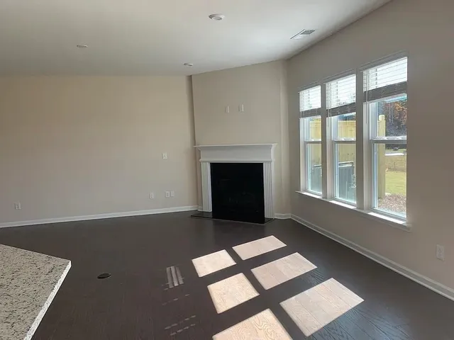 an empty room with windows