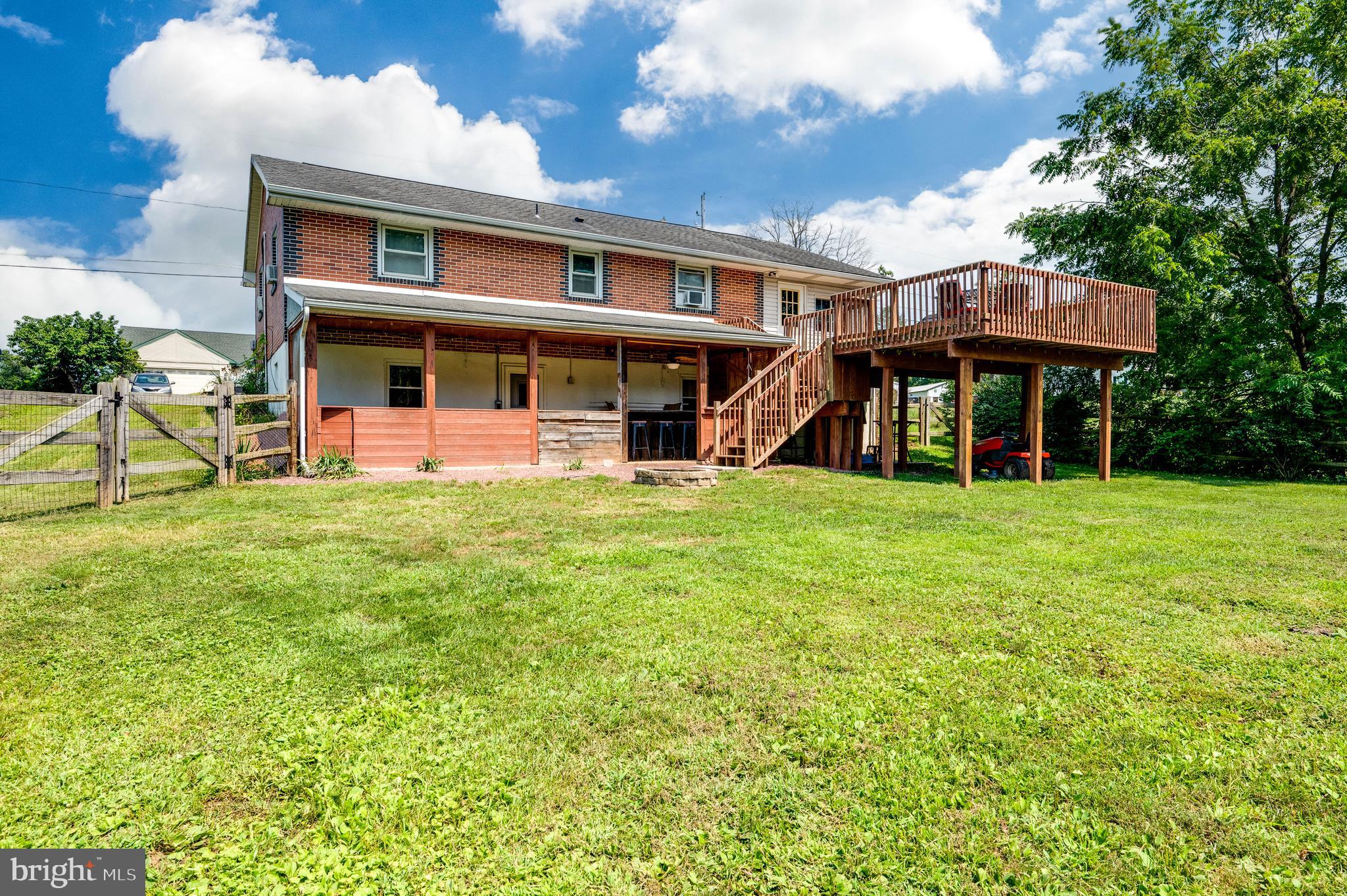 1144 Brownsville Road Wernersville, PA 19565 - Photo 2 of 24 a view of a house with a yard porch and sitting area