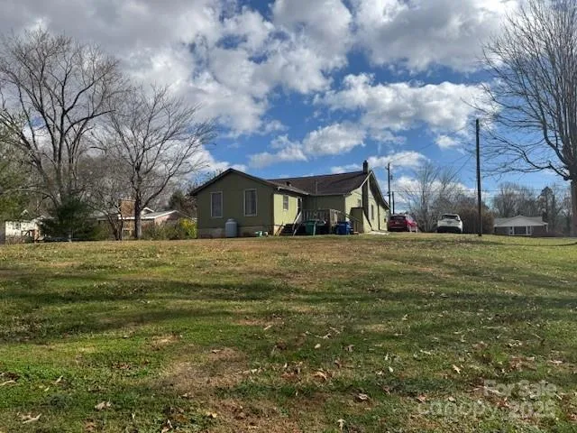 a view of house with outdoor space