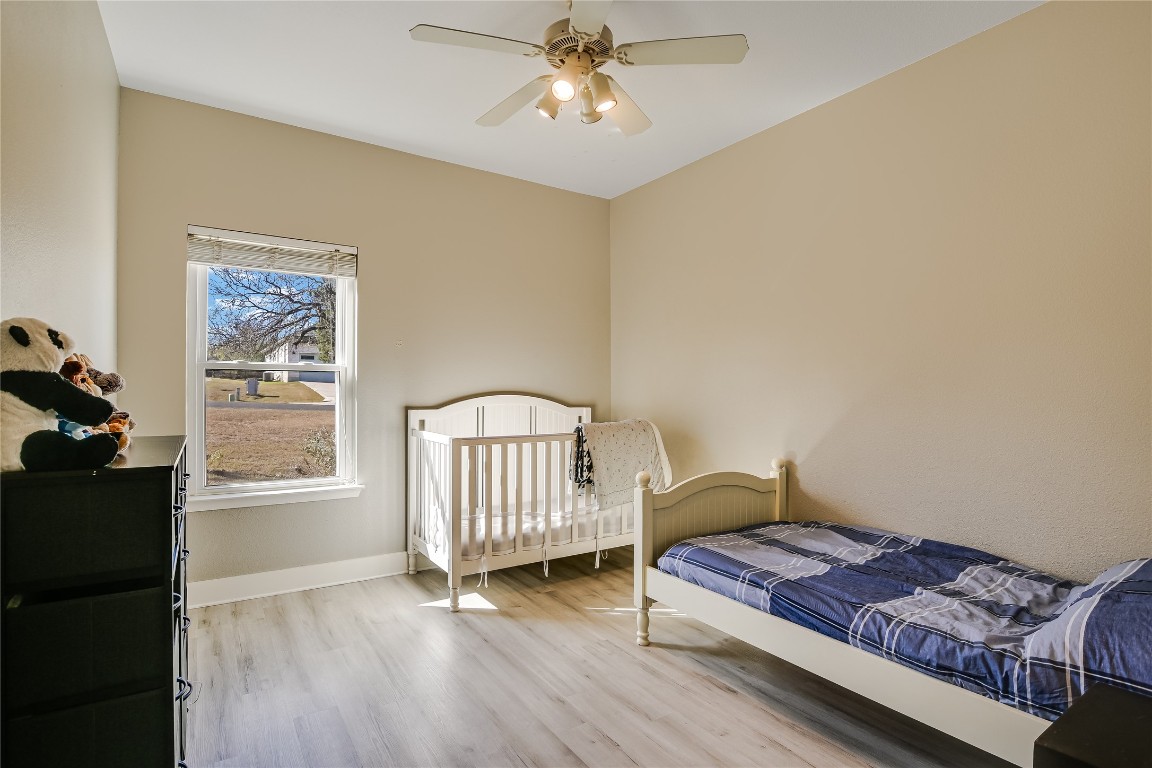 945 Wesley Ridge Drive Spicewood, TX 78669 - Photo 26 of 40 Each of the four guest bedrooms is spacious and versatile.