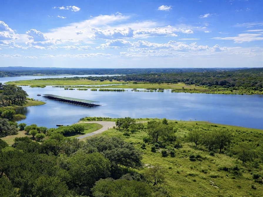945 Wesley Ridge Drive Spicewood, TX 78669 - Photo 34 of 40 The community has two private boat launches, each designed to accommodate varying lake levels.
