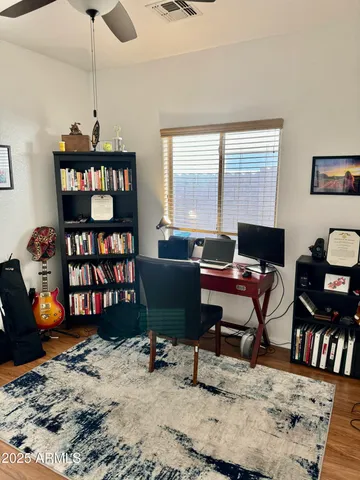 a workspace with a bookshelf