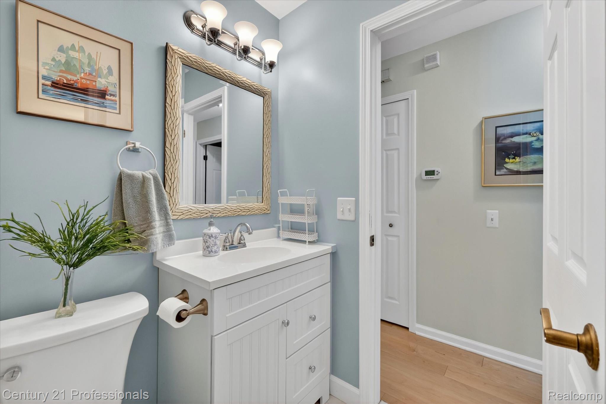 134 Foxboro Drive Rochester, MI 48309 - Photo 21 of 39 Half bath featuring vanity and light wood-style flooring