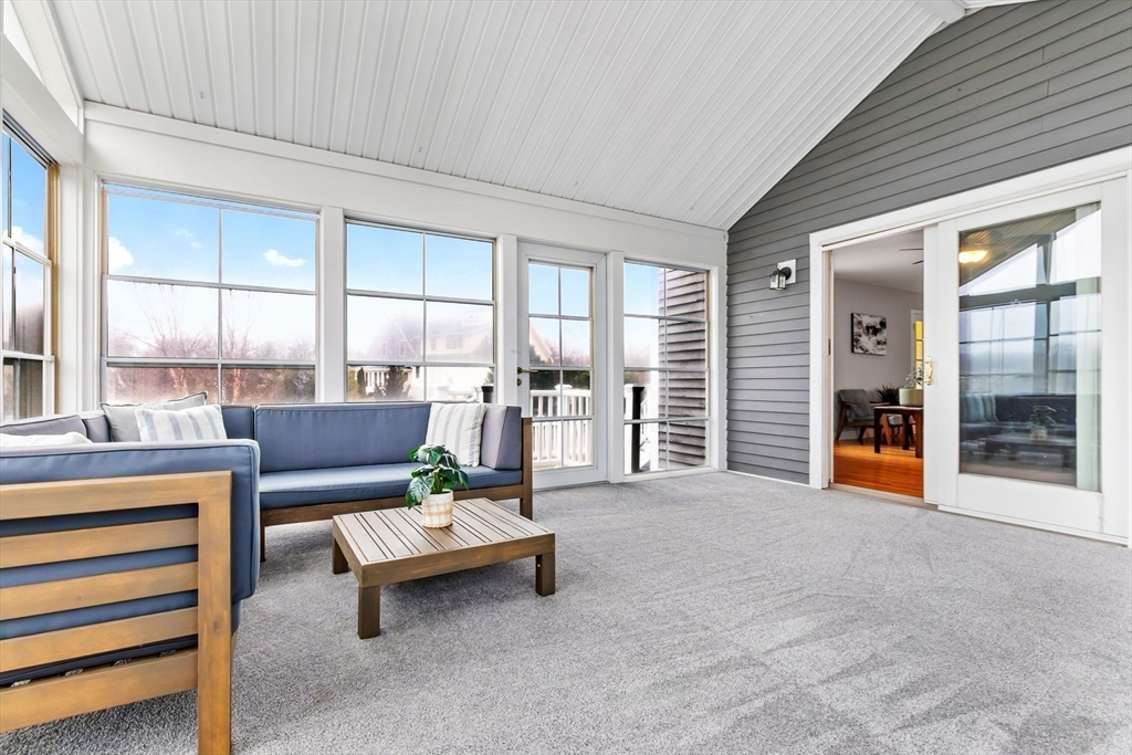 253 High Road Newbury, MA 01951 - Photo 13 of 42 a living room with furniture and large windows