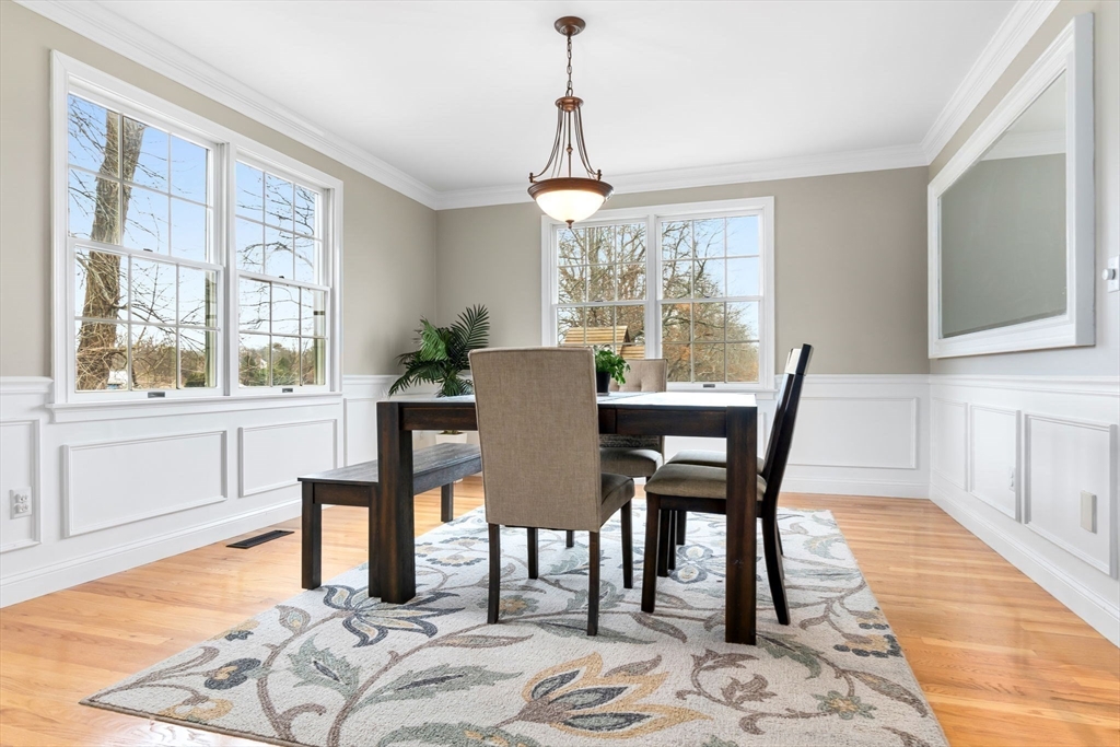 253 High Road Newbury, MA 01951 - Photo 15 of 42 a view of a dining room with furniture window and wooden floor