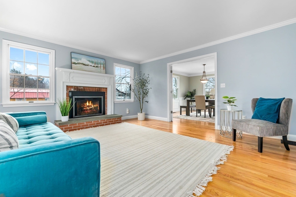 253 High Road Newbury, MA 01951 - Photo 16 of 42 a living room with furniture and a fireplace