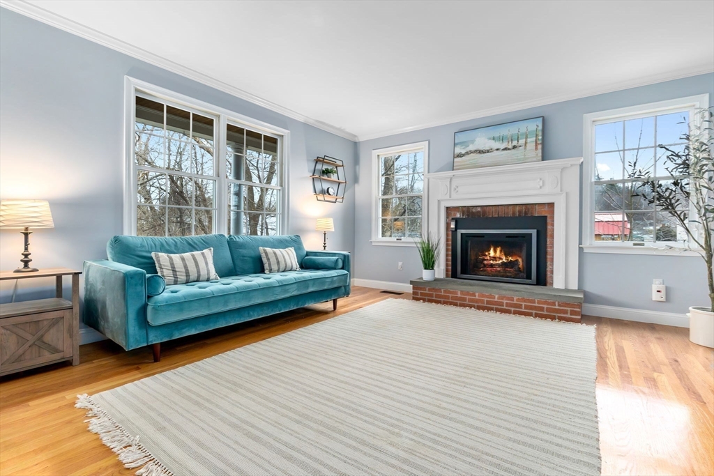 253 High Road Newbury, MA 01951 - Photo 17 of 42 a living room with furniture and a fireplace