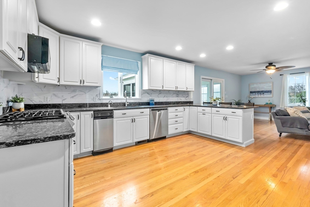 253 High Road Newbury, MA 01951 - Photo 4 of 42 a kitchen with a sink cabinets and window