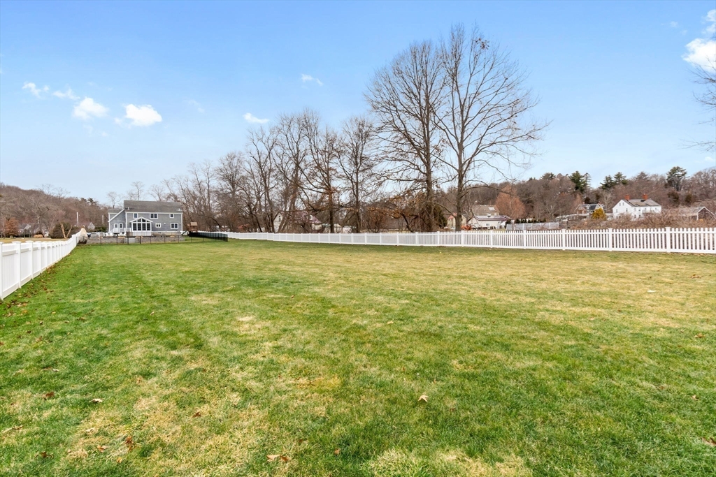 253 High Road Newbury, MA 01951 - Photo 41 of 42 a view of a swimming pool and trees in the background