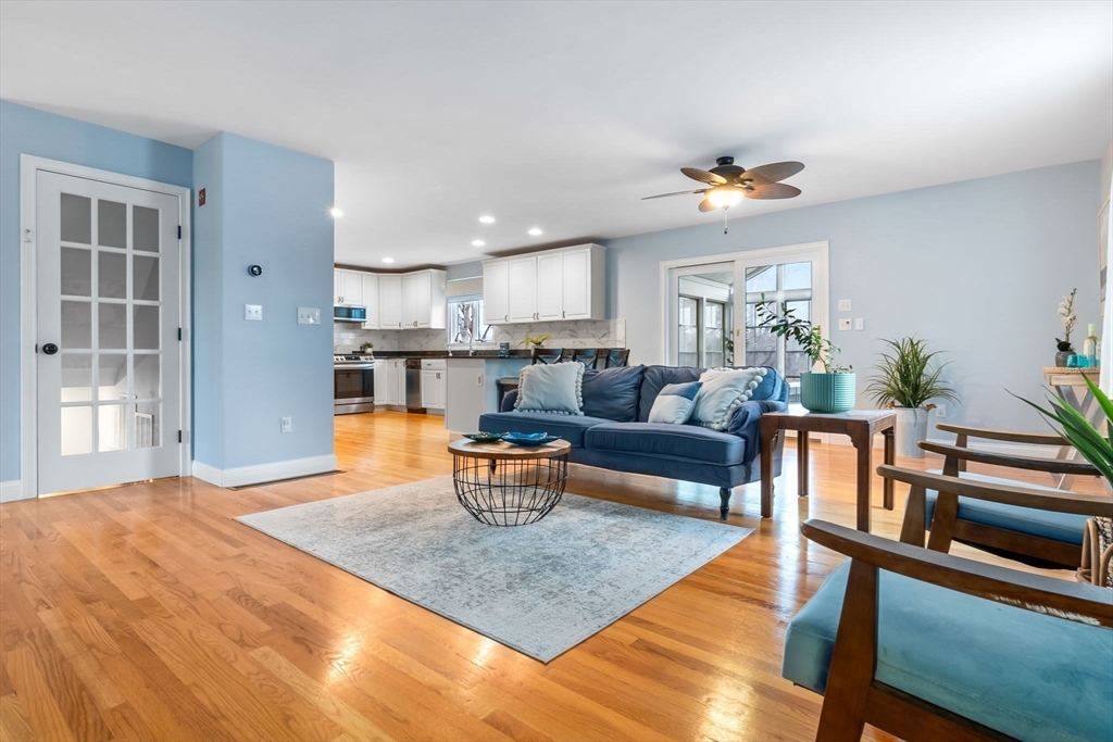 253 High Road Newbury, MA 01951 - Photo 8 of 42 a living room with dining room and wooden floor