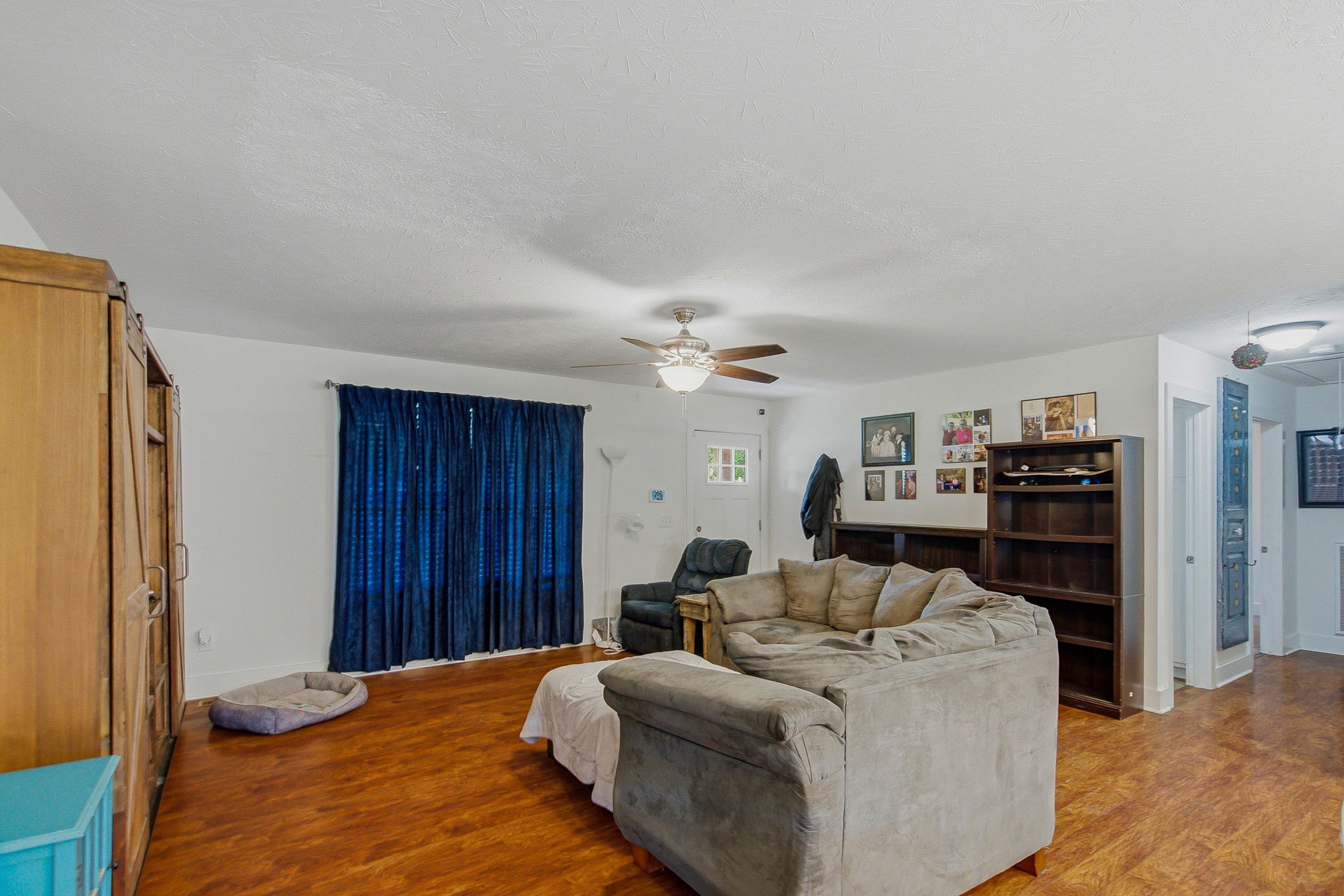 222 Hog Back Ridge Road Bethpage, TN 37022 - Photo 8 of 28 a living room with furniture and a flat screen tv