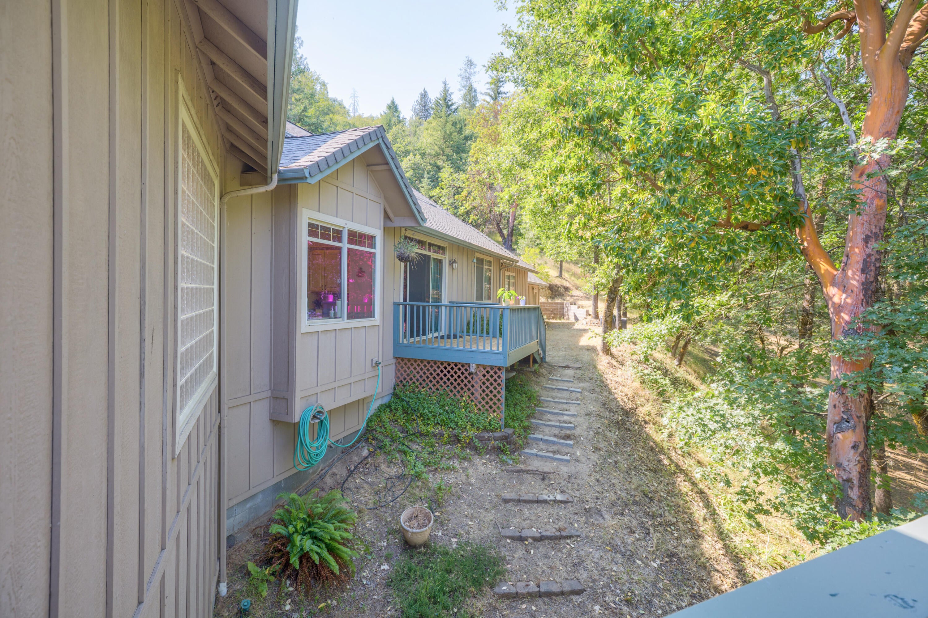 5668 Upper River Road Grants Pass, OR 97526 - Photo 36 of 50 deck off guest bedroom