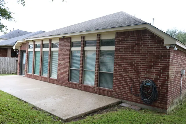 a view of backyard of house
