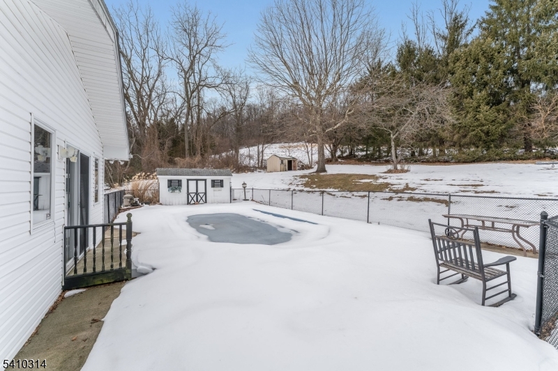 252 Mountain View Road West Asbury, NJ 08802 - Photo 22 of 28 a view of a swimming pool with a patio