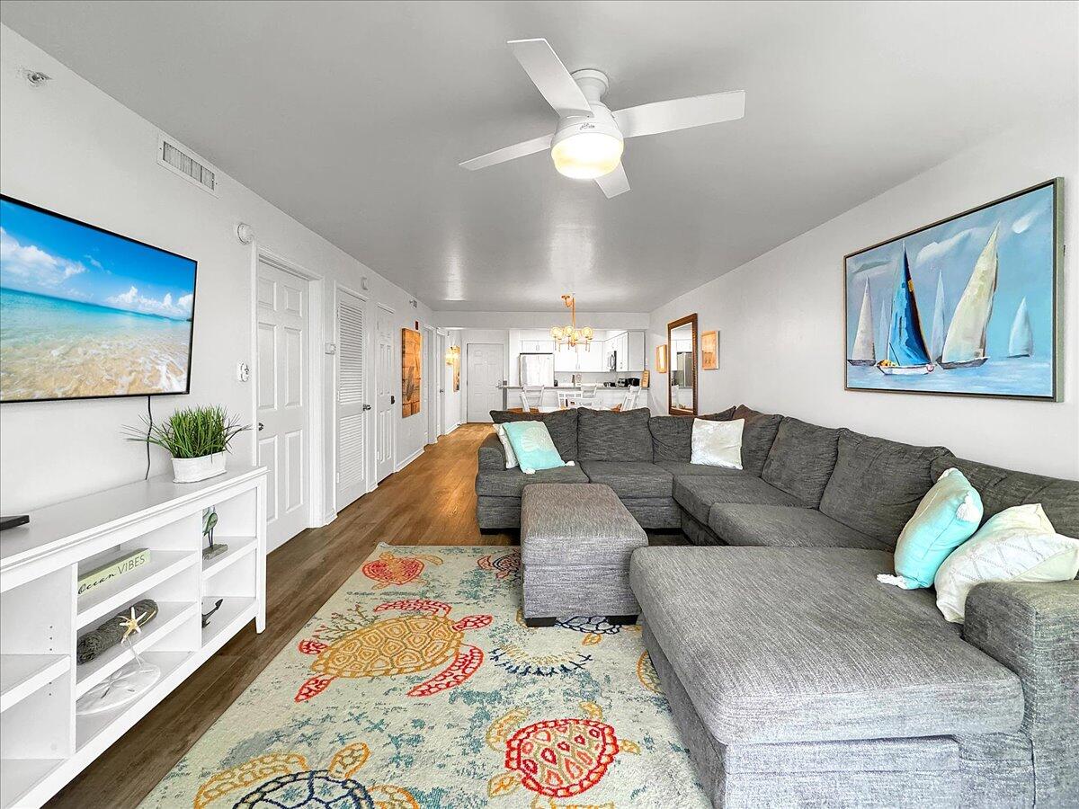 1002 Highway 98, Unit 316 Destin, FL 32541 - Photo 11 of 31 a living room with furniture and a large window