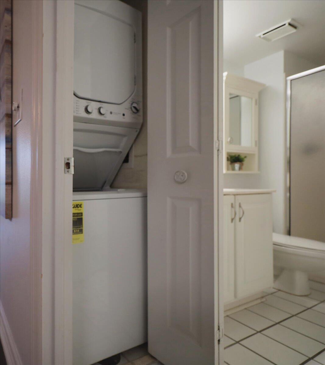 1002 Highway 98, Unit 316 Destin, FL 32541 - Photo 17 of 31 a utility room with dryer and washer