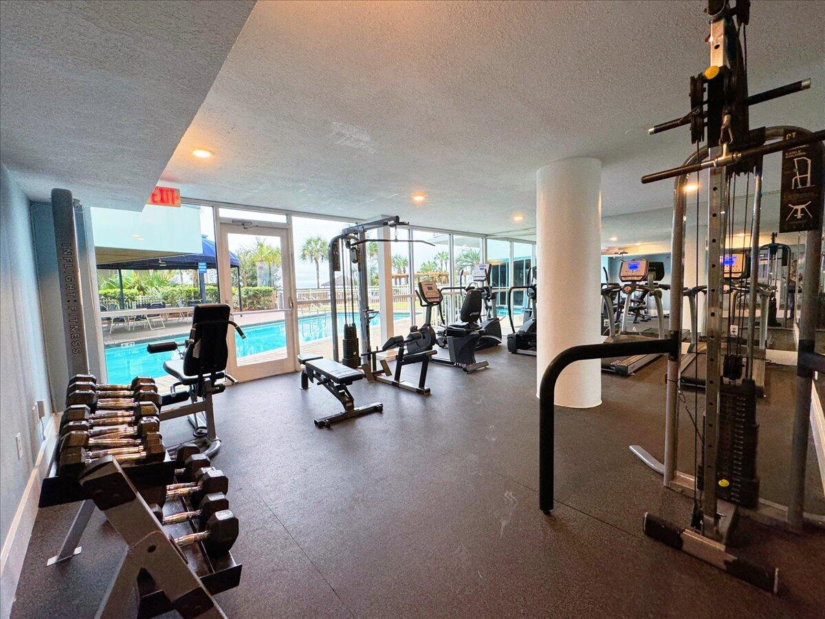 1002 Highway 98, Unit 316 Destin, FL 32541 - Photo 24 of 31 a view of a room with gym equipment