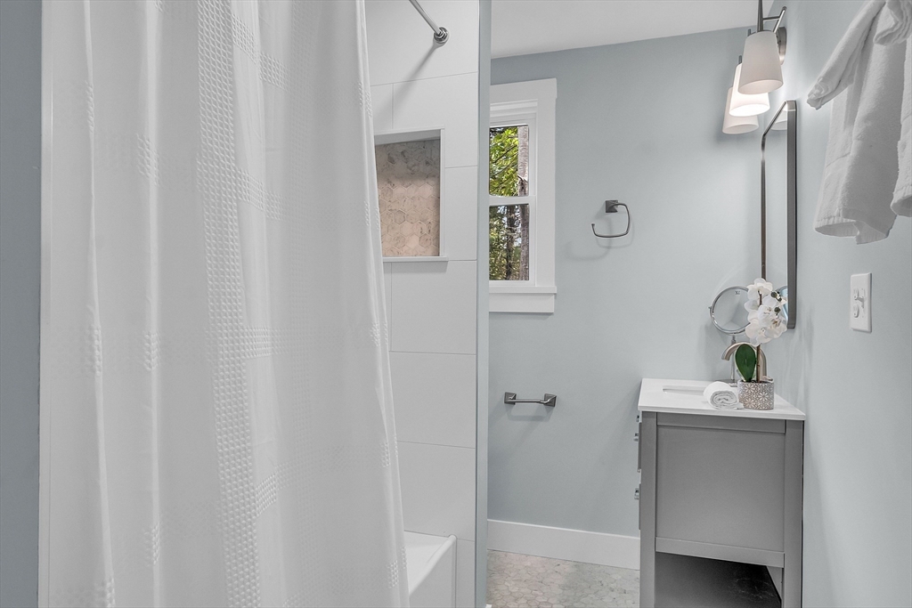 43 Brown Road Harvard, MA 01451 - Photo 18 of 23 a bathroom with a sink and a mirror