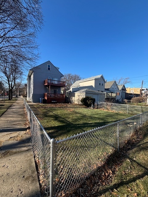 4701 North Kilbourn Avenue, Unit 2 Chicago, IL 60630 - Photo 2 of 13 a view of a house with a yard