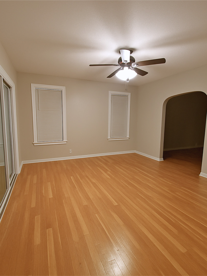 4701 North Kilbourn Avenue, Unit 2 Chicago, IL 60630 - Photo 9 of 13 a view of empty room with wooden floor