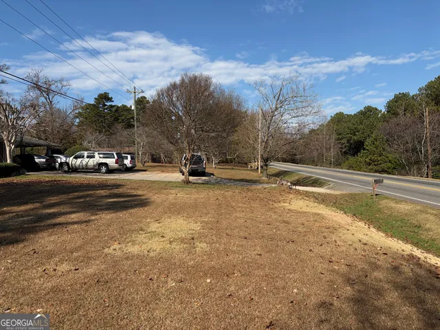 a view of street with houses